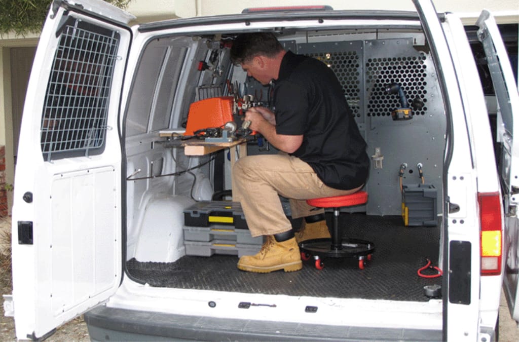 Man Works on Mobile Locksmith repair